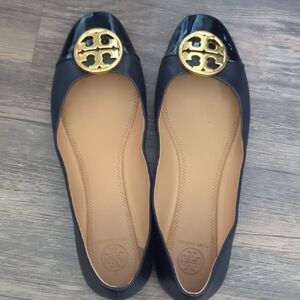 Tory Burch Black and Gold Flats with Signature Logo